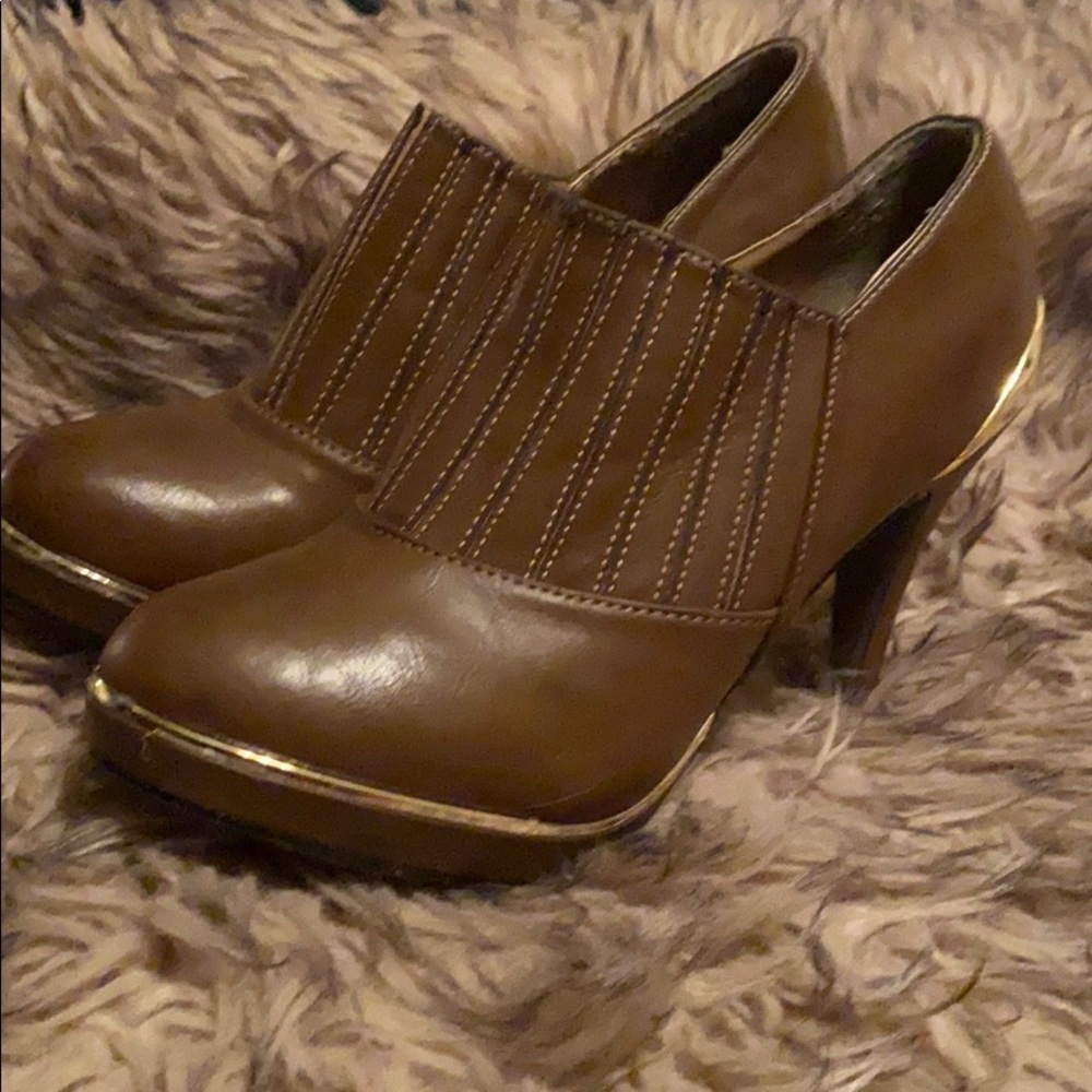 Brown and gold heels